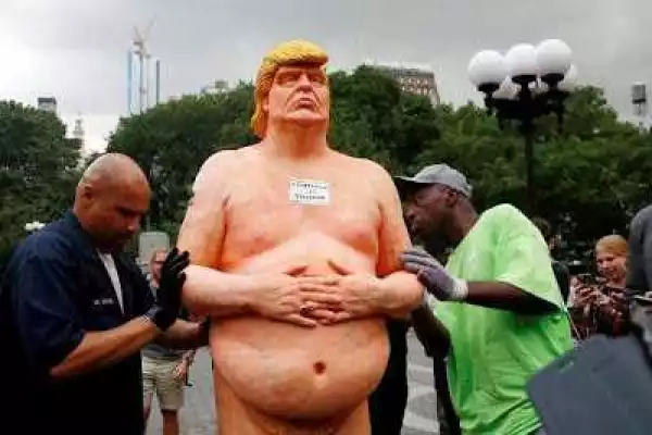 Photo: " What Will Happen To Anyone Who does This To Buhari ? ": Alibaba On Public Display Of Life-Size N*ked Statue Of Donald Trump